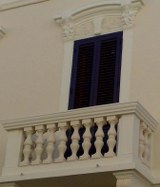 Tuscan house window shutters