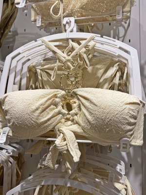 Italian swimwear trends with Luxury-looking jewelry details - Decorative chains